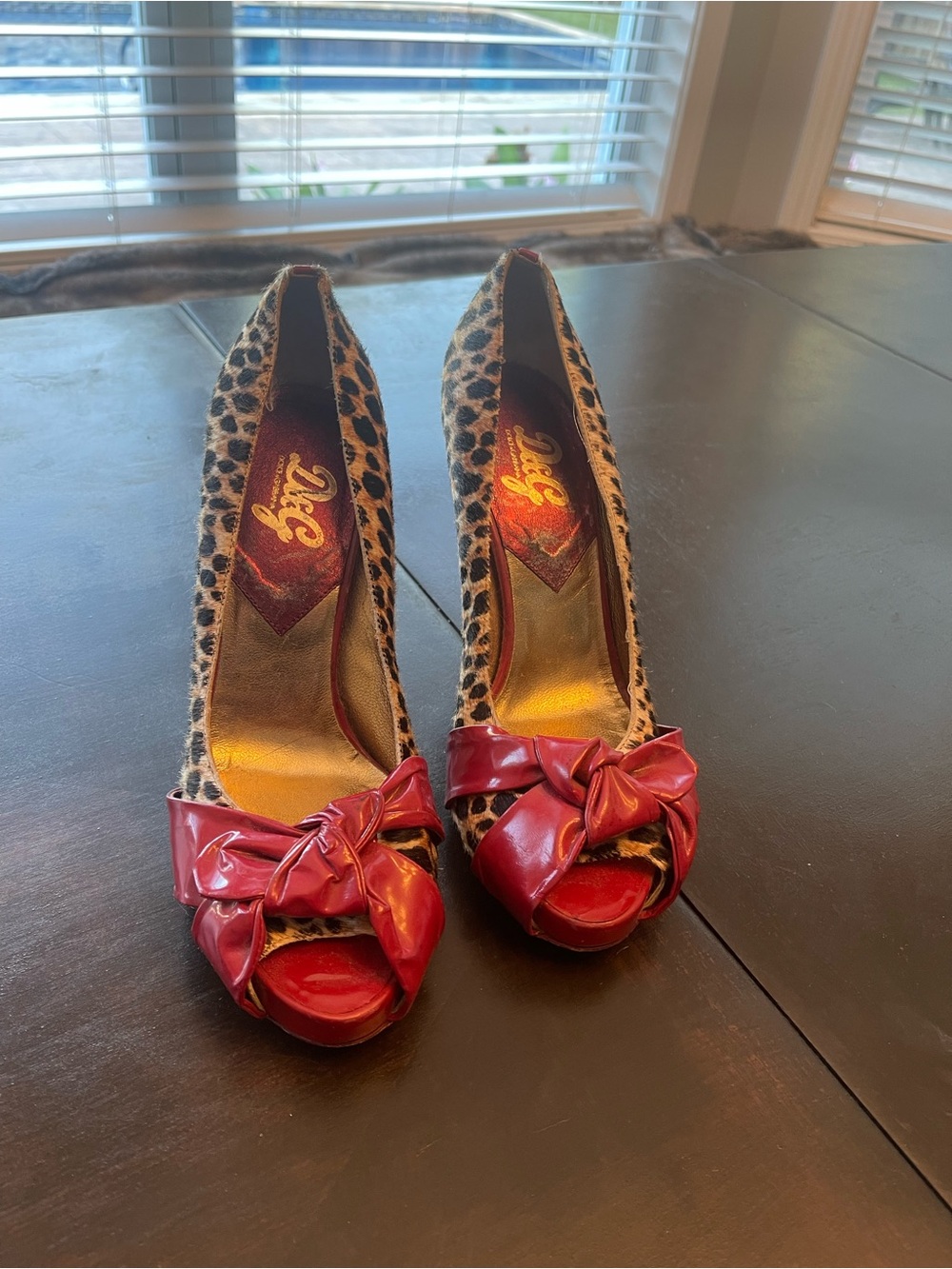 Leopard Print Peep-Toe Pumps with Red Bow Accent